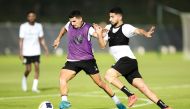 Al Sadd's Youssef Atal (left) and Mohammed Waad in action during a training session.