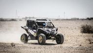 Ahmed Al Kuwari and his navigator Nasser Al Kuwari of Qatar driving their Yamaha YXZ 1000 R.