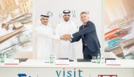 CEO of Visit Qatar Eng. Abdulaziz Ali Al Mawlawi (centre); E1 Chairman Alejandro Agag (right); and President, CEO and Member of the Board of UDC, Ibrahim Jassim Al Othman at the signing ceremony yesterday.
