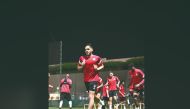 Al Gharafa's Wajdi Kechrida trains with teammates.