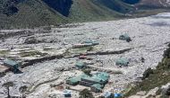 In this photograph taken on September 18, 2024, houses lie abandoned in the aftermath of flood caused by glacial lake outburst, at Thame village in Solukhumbu district. (Photo by Migma Nuru Sherpa / AFP)
 
