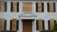 A boarded up house for sale in the the front yard in Dunedin ahead of Hurricane Milton's expected landfall tonight on October 9, 2024 in Florida. Photo by Bryan R. SMITH / AFP