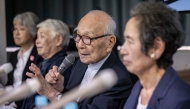 Member of the Nihon Hidankyo and atomic bomb survivor, co-chair Terumi Tanaka (2nd R) speaks during a press conference in Tokyo on October 12, 2024. Photo by Yuichi YAMAZAKI / AFP.

