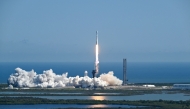 A SpaceX Falcon Heavy rocket with the Europa Clipper spacecraft aboard launches from Launch Complex 39A at NASA's Kennedy Space Center in Cape Canaveral on October 14, 2024. Photo by CHANDAN KHANNA / AFP