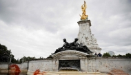 Red stains are seen on the Queen Victorial Memorial outside Buckingham Palace in central London on August 26, 2021 after climate activists from the Animal Rebellion conducted a protest action. (Photo by Tolga Akmen / AFP)