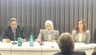 Deputy Permanent Representative of the Permanent Delegation of Qatar in Geneva Jawhara bint Abdulaziz Al Suwaidi (centre), President of ICSS Mohammed Al Hanzab (left) and Aziyade Poltier from the Director General’s office at the United Nations Office in Geneva during the event.