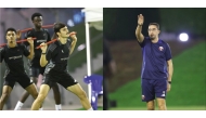 Qatar U-17 players (on the left) during a training session, and Qatar U-17 coach Ahmed Madouni (on the right) on October 22, 2024. 