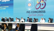 Qatar Olympic Committee Secretary-General Jassim bin Rashid Al Buenain (fourth left), FIG President Morinari Watanabe (centre), and FIG First Vice President and Qatar Gymnastics Federation President Ali Al Hitmi (second right) with other top officials during the opening day of the FIG Congress in Doha, yesterday.