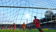 Bochum's German goalkeeper #27 Patrick Drewes (C) fails to save the 0-4 goal during the German first division Bundesliga football match between VfL Bochum and FC Bayern Munich in Bochum, western Germany, on October 27, 2024. (Photo by Ina Fassbender / AFP) 