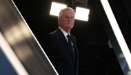 France's Prime Minister Michel Barnier looks on as he waits for entering the set of the political TV show 