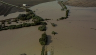 An aerial picture shows a road flooded in Arcos de la Frontera, near Cadiz, on October 31, 2024, after heavy rains hit southern Spain. (Photo by JORGE GUERRERO / AFP)
