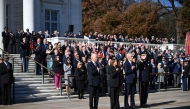 US President Joe Biden (L), Vice President Kamala Harris (2nd L) and Veterans' Affairs Secretary Dennis McDonough stand at attentiin before Biden lays a wreath at The Tomb of the Unknown Soldier at Arlington National Cemetery to mark Veterans' Day on November 11, 2024 in Arlington, Virginia. (Photo by ANDREW CABALLERO-REYNOLDS / AFP)
