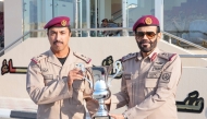 Commander of the Amiri Guard H E Lt. Gen. Hazza bin Khalil Al Shahwani (right) during the ceremony.
