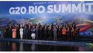 World leaders gather for a group photo on the second day of the G20 Summit in Rio de Janeiro, Brazil, on November 19, 2024. (Photo by Leah Millis / POOL / AFP)

