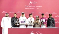 Qatar Racing and Equestrian Club Racing Manager Abdulla Rashid Al Kubaisi crowned the winners of the Bu Samrah Cup. PIC: Juhaim/QREC
