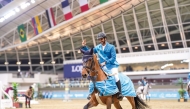 Qatar’s Mohammed Saeed Haidan celebrates after winning the Al Shaqab Champions 130 cm class in the first round of the Al Shaqab League at the Longines Indoor Arena yesterday.