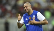 Brazilian former football player Adriano gestures during his friendly farewell match with legends of Brazil's Flamengo and Italy's Inter Milan at Maracana Stadium in Rio de Janeiro on December 15, 2024. (Photo by Daniel RAMALHO / AFP)