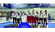 Qatar's players pose on the podium.