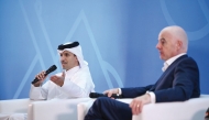 President of Qatar Football Association and QSL Jassim bin Rashid Al Buenain, sitting alongside FIFA President Gianni Infantino, speaks during the opening session.    