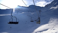 (FILES) Skiers sit on chairlifts at Sainte-Anne, a small ski resort near La Condamine-Chatelard, in the French Alps, on January 6, 2024. (Photo by Nicolas TUCAT / AFP)

