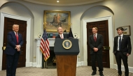 US President Donald Trump (L), Larry Ellison, Executive Charmain Oracle, and Sam Altman (R), CEO of Open AI listen to Masayoshi Son, Chairman and CEO of SoftBank Group Corp speak in the Roosevelt Room at the White House on January 21, 2025, in Washington, DC. (Photo by Jim Watson / AFP)
 