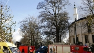 File photo: Belgian firefighters stand outside the Grand Mosque in Brussels, Belgium, November 26, 2015.
