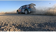Qatar's Nasser Saleh Al Attiyah and navigator Candido Carrera drive during the 28th Oman International Rally, yesterday.