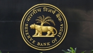 The Reserve Bank of India (RBI) logo is seen at the RBI headquarters in Mumbai on August 10, 2023. (Photo by Indranil Mukherjee / AFP)