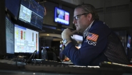Traders work on the floor of the New York Stock Exchange (NYSE) in New York on February 3, 2025. (Photo by ANGELA WEISS / AFP)
