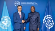 Minister of Labour H E Dr. Ali bin Smaikh Al Marri during a meeting with Director-General of the ILO H E Gilbert Houngbo.
