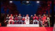 QMMF Executive Director Amro Al Hamad with the leading drivers at the ceremonial start yesterday.