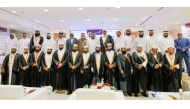 Undersecretary of the Ministry of Awqaf and Islamic Affairs H E Dr. Sheikh Khalid bin Mohammed bin Ghanem Al Thani and Ambassador of South Africa to Qatar H E Ghulam Hoosein Asmal  with officials and honourees during the ceremony.