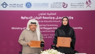 Shaikha Abdulrahman Al Badi, Undersecretary for National Manpower Affairs in the Private Sector and H E Sheikh Faisal bin Qassim Al Thani, Chairman of Al Faisal Holding Group exchanging documents after signing the agreement.