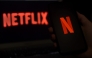In this photo illustration a computer screen displays the Netflix logo on March 31, 2020 in Arlington, Virginia. Photo by Olivier DOULIERY / AFP
