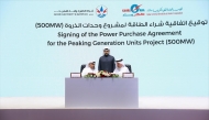 Minister of State for Energy Affairs H E Saad Sherida Al Kaabi witnessing an agreement signed by President of Kahramaa H E Eng Abdulla bin Ali Al Theyab, and Managing Director and CEO of QEWC Eng Mohammed Nasser Al Hajri.
