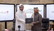 General Manager of Katara H E Professor Dr. Khalid bin Ibrahim Al Sulaiti (right) and Secretary-General of National Archives of Qatar Dr. Ahmed Al Buainain at the agreement signing ceremony.