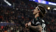 Arsenal's Italian defender #33 Riccardo Calafiori celebrates scoring his team's seventh goal during the UEFA Champions League round of 16 first leg football match between PSV Eindhoven (NED) and Arsenal FC (ENG) at the the PSV Stadion, in Eindhoven, on March 4, 2025. (Photo by MAURICE VAN STEEN / ANP / AFP) / Netherlands OUT
