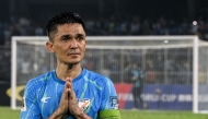 India's captain Sunil Chhetri greets his fans at the end of the FIFA World Cup 2026 Asia qualifier match between India and Kuwait at the Salt Lake Stadium in Kolkata on June 6, 2024. (Photo by Dibyangshu Sarkar / AFP)