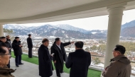 This undated picture released from North Korea's official Korean Central News Agency (KCNA) via KNS on March 8, 2025 shows North Korean leader Kim Jong Un (C) inspecting a development project at the Onpho Kulloja (working people) Holiday Camp in North Hamgyong Province of North Korea. (Photo by KCNA VIA KNS / AFP)