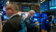 Traders work on the floor of the New York Stock Exchange (NYSE) on March 11, 2025 in New York City. (Photo by SPENCER PLATT / GETTY IMAGES NORTH AMERICA / Getty Images via AFP)
