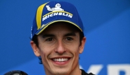 Ducati Lenovo's Spanish rider Marc Marquez gestures after getting pole position in the MotoGP Argentina Grand Prix qualifying session at the Termas de Rio Hondo circuit in Santiago del Estero, Argentina on March 15, 2025. (Photo by Luis Robayo / AFP)