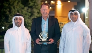 Chairman of Qatar Tourism H E Saad bin Ali Al Kharji and the CEO of Katara Hospitality Nasser Matar Al Kawari with Gerhard Foltin.