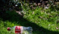 A 100 percent recycled Coca-Cola bottle in Centreville, Maryland on March 25, 2025. (Photo by Jim Watson / AFP)
