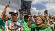 Supporters of former Philippine president Rodrigo Duterte take part in a motorcade rally to celebrate his 80th birthday at Quirino Grandstand in Manila on March 28, 2025. Photo by Earvin Perias / AFP