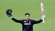 New Zealand's Mark Chapman celebrates 100 runs during the 1st ODI cricket match between New Zealand and Pakistan at McLean Park in Napier on March 29, 2025. (Photo by Marty MELVILLE / AFP)

