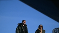 US Vice President JD Vance and Second Lady Usha Vance board Air Force Two after touring the US military's Pituffik Space Base in Greenland on March 28, 2025. (Photo by Jim WATSON / POOL / AFP)
