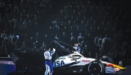 Racing Bulls’ French driver Isack Hadjar (left) and Racing Bulls’ Japanese driver Yuki Tsunoda (rear) during the Formula One - 2025 season launch event, in this February 18 file photo.