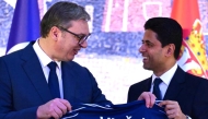 European Club Association Chairman Nasser Al Khelaifi presents a PSG jersey to President of Serbia H E Aleksandar Vucic.
