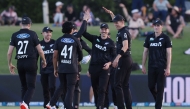 New Zealand players celebrate the wicket of Pakistan Usman Khan during the third one day international (ODI) cricket match between New Zealand and Pakistan at Bay Oval in Mount Maunganui on April 5, 2025. (Photo by Michael Bradley / AFP)
