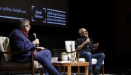 Lav Diaz (right) speaking at his Masterclass at Qumra.